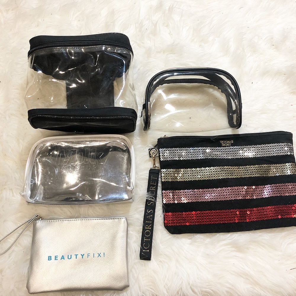Bundle of 5 travel cases. Bonus Vic Sec wristlet